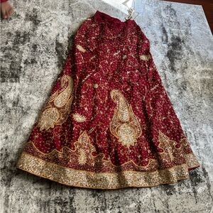 Red and gold Indian wedding dress. Shalwar kameez